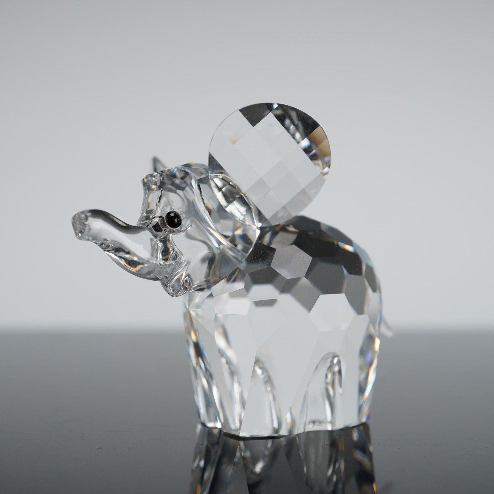 Swarovski Silver Crystal Small Elephant Raised Trunk 7640 000 060 Retired Boxed