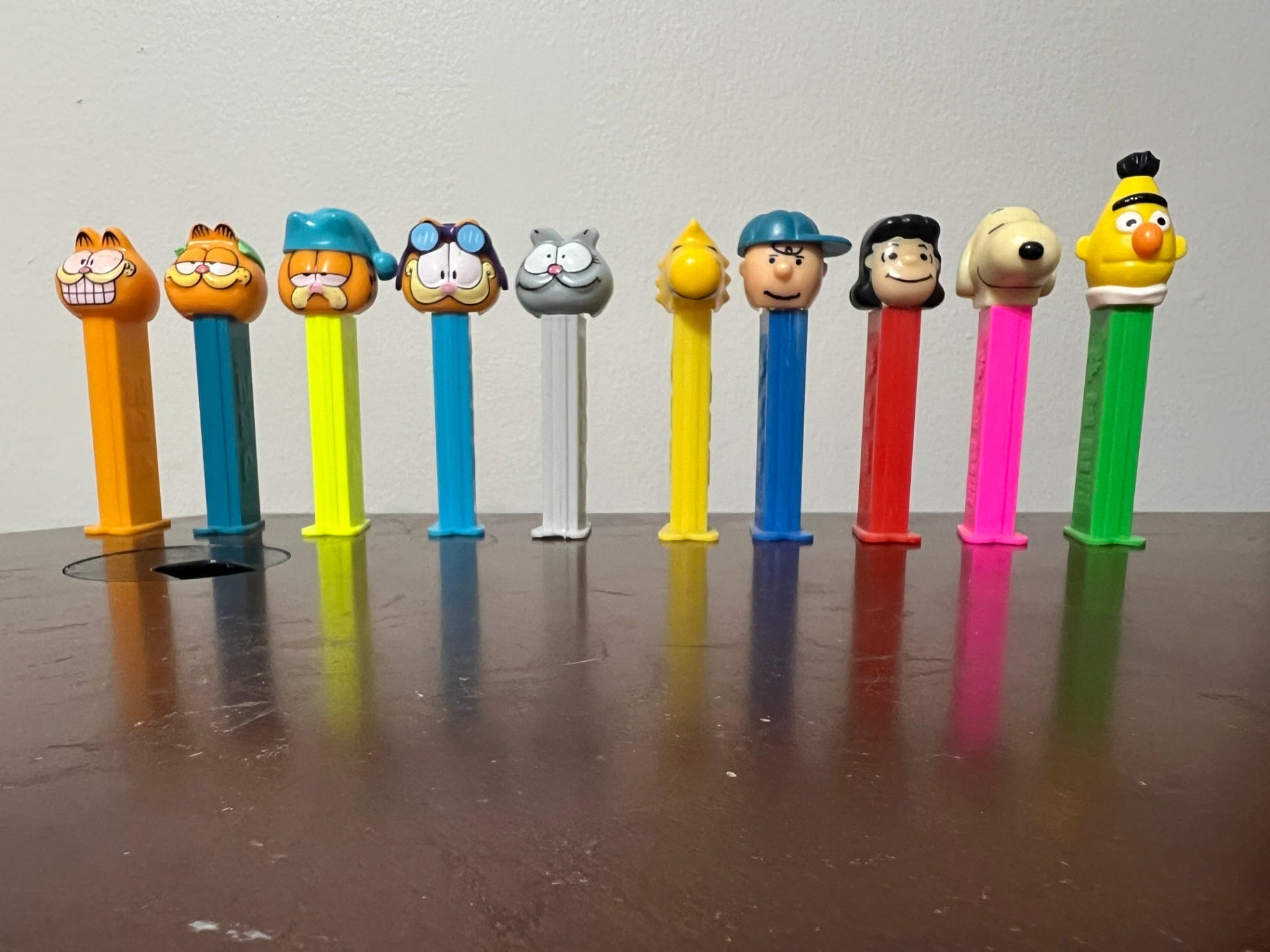Lot of 10 PEZ - Garfield Nermal Snoopy Woodstock Lucy Linus Bert