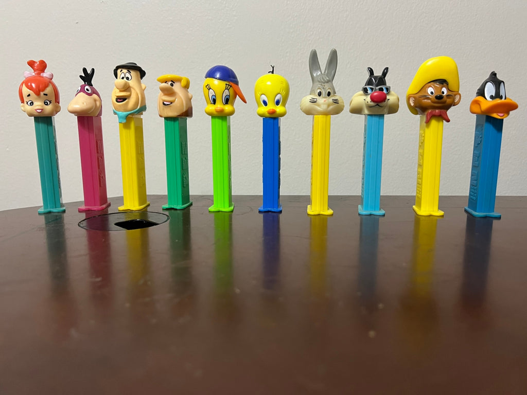 Lot of 10 PEZ - Flintstones Fred Barney Pebbles Dino - Looney Tunes Bugs Sylvester
