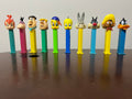 Lot of 10 PEZ - Flintstones Fred Barney Pebbles Dino - Looney Tunes Bugs Sylvester