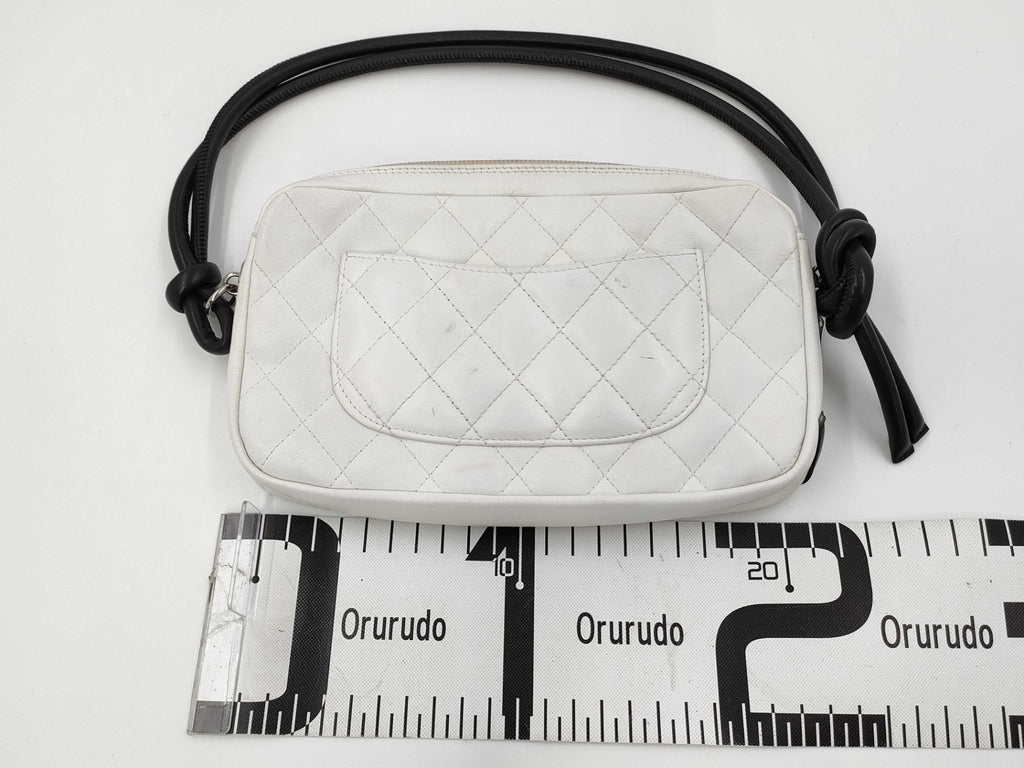 Authentic Chanel Ligne Cambon Quilted White Leather Pochette Bag