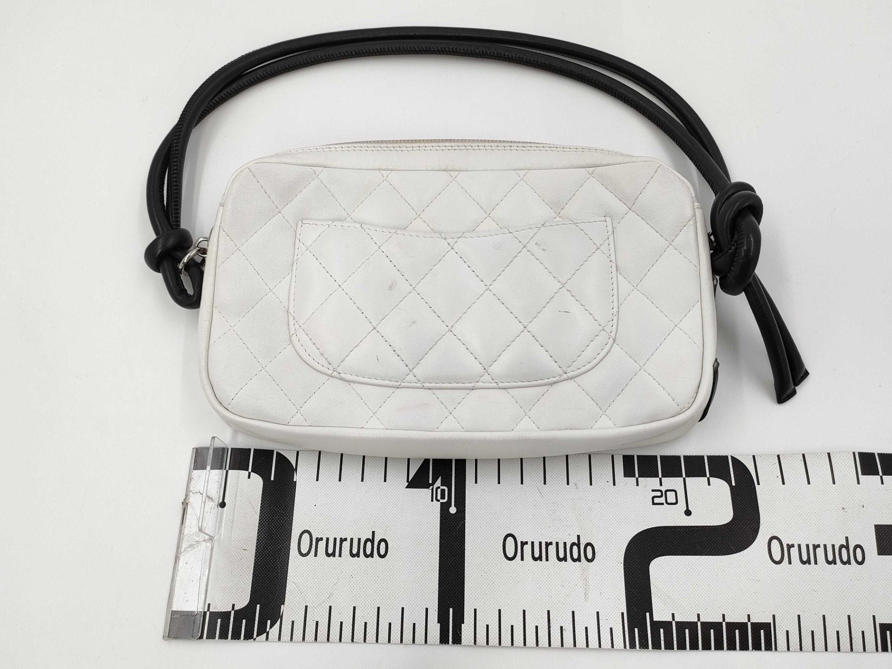 Authentic Chanel Ligne Cambon Quilted White Leather Pochette Bag