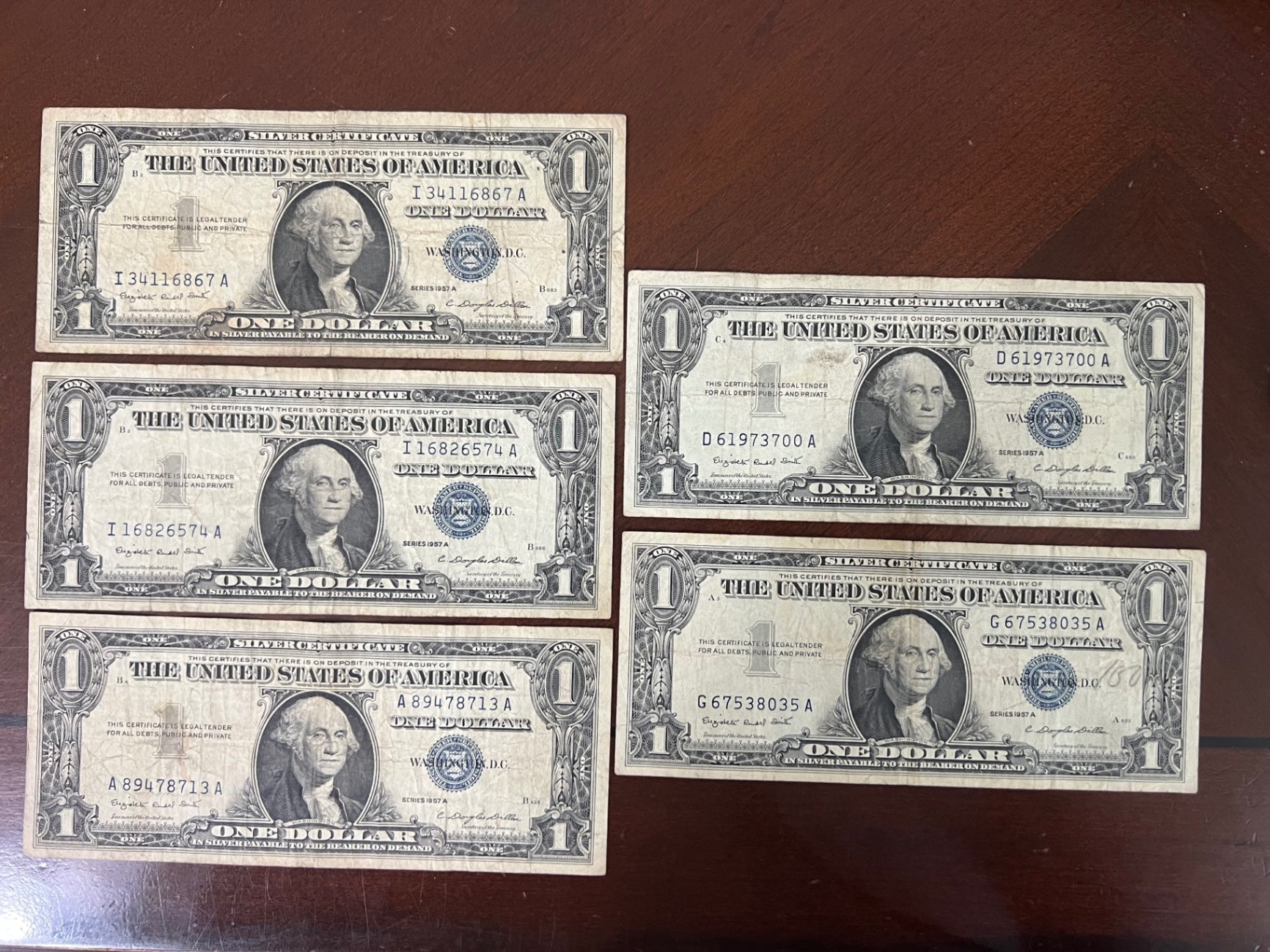 Lot of (5) 1957-A $1 Silver Certificates - Blue Seals - Smith/Dillon Signatures