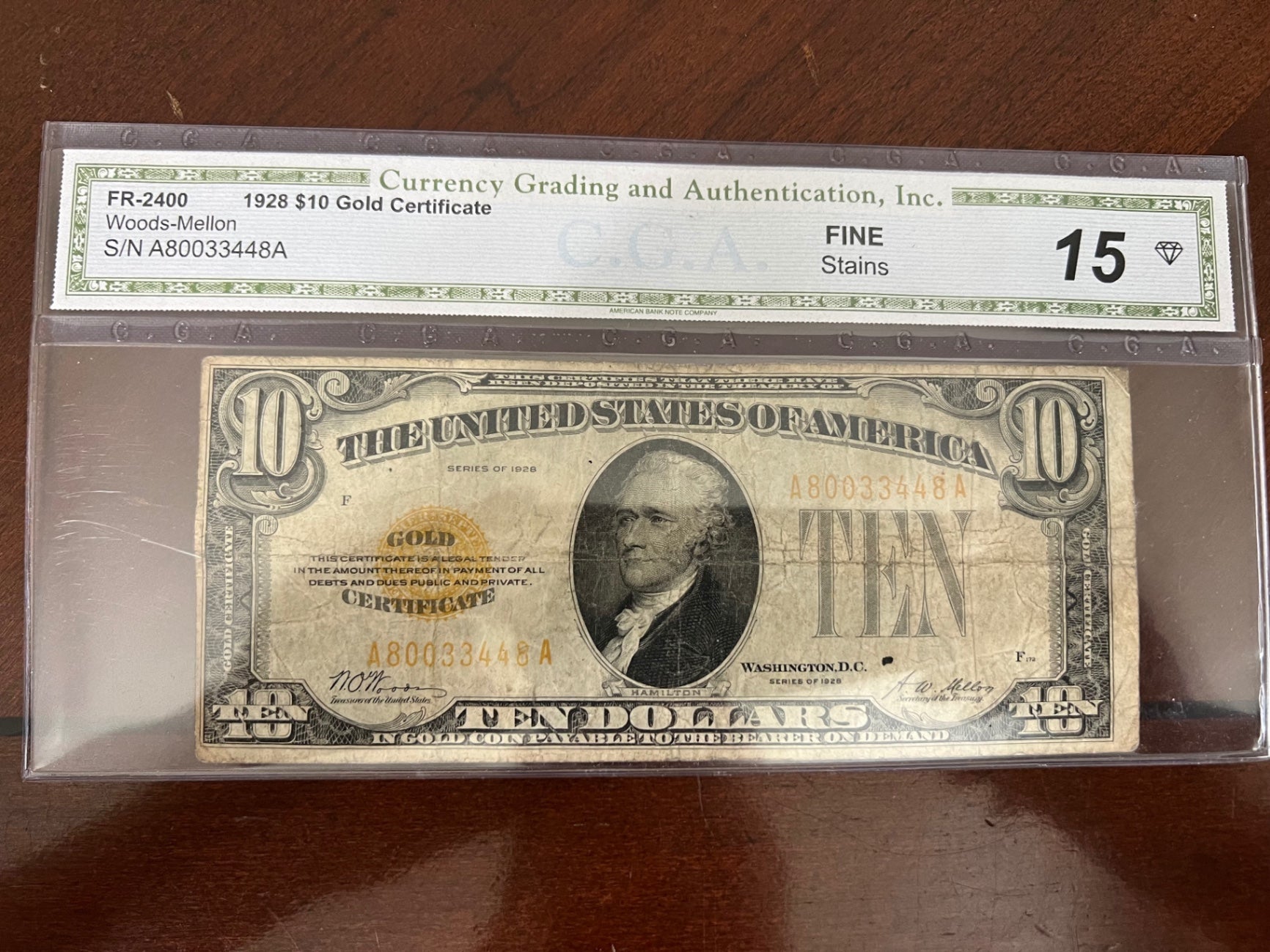 1928 $10 Gold Certificate Woods-Mellon CGA 15