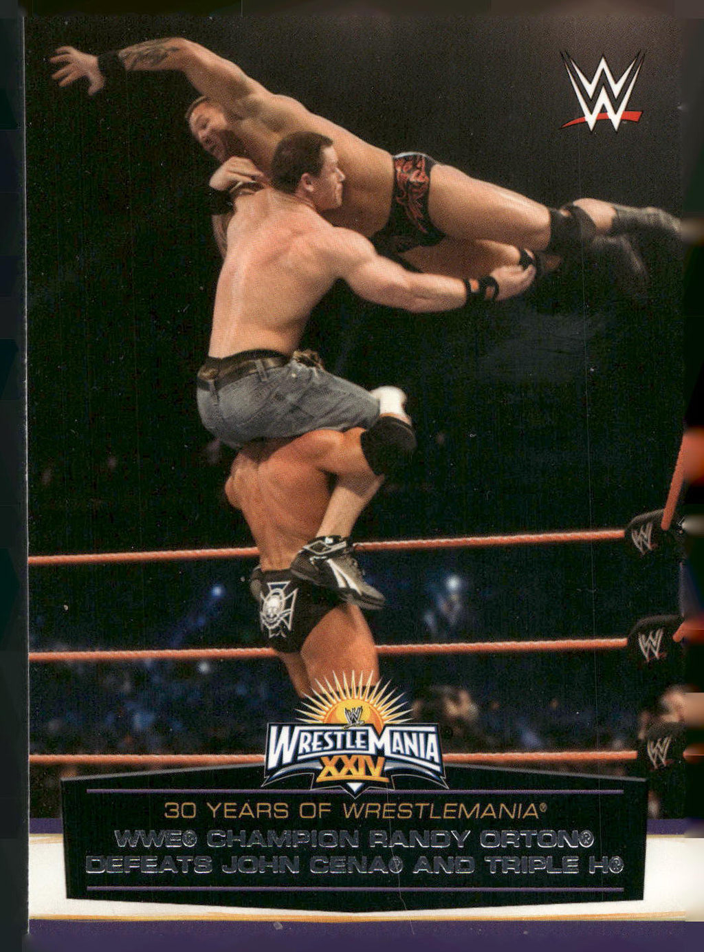 2014 Topps WWE Road to Wrestlemania #48 Randy Orton Defeats John Cena and Triple