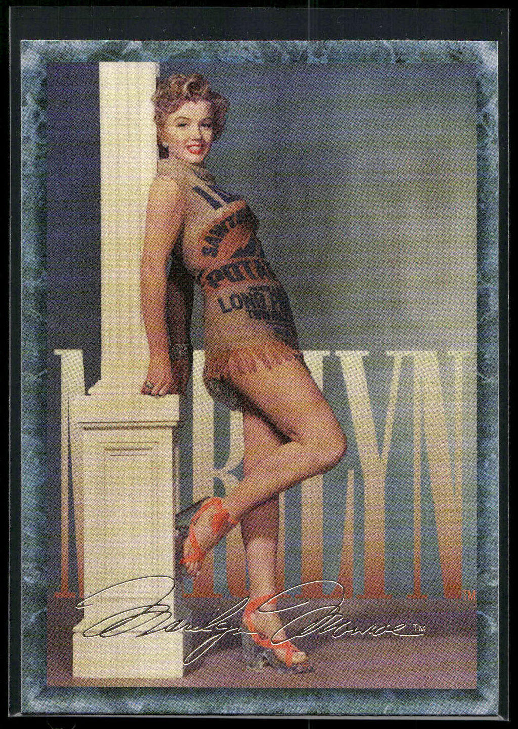 1993 Sports Time Marilyn Monroe #16 A Marilyn appearance in a low-cut red dress