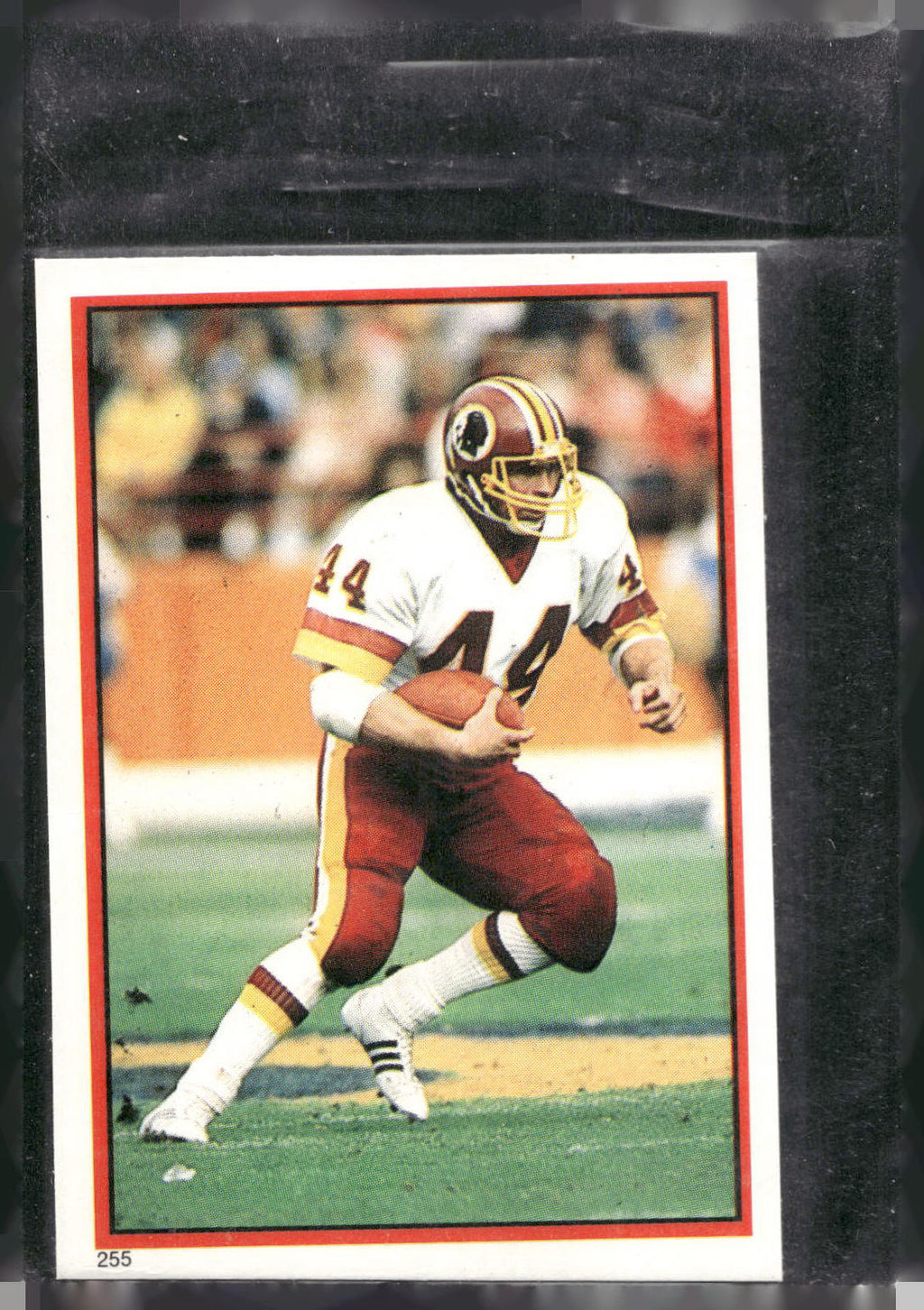 1985 Topps #255 John Riggins Yearbooks Coming Soon Stickers