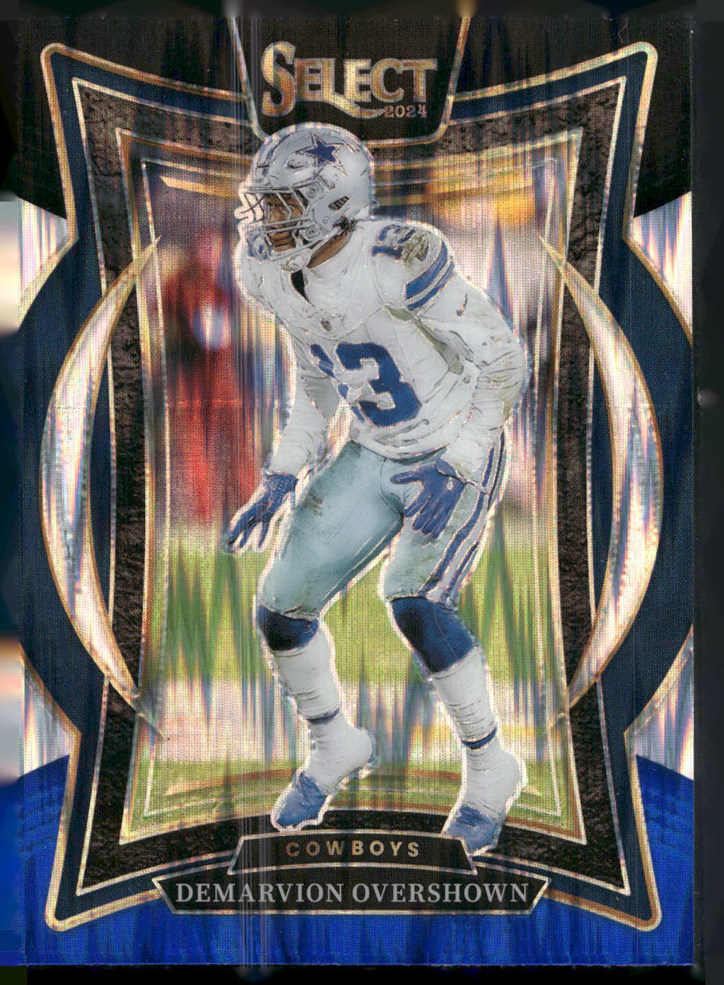 2024 Panini Select #48 Demarvion Overshown Black & Blue Prizm Shock