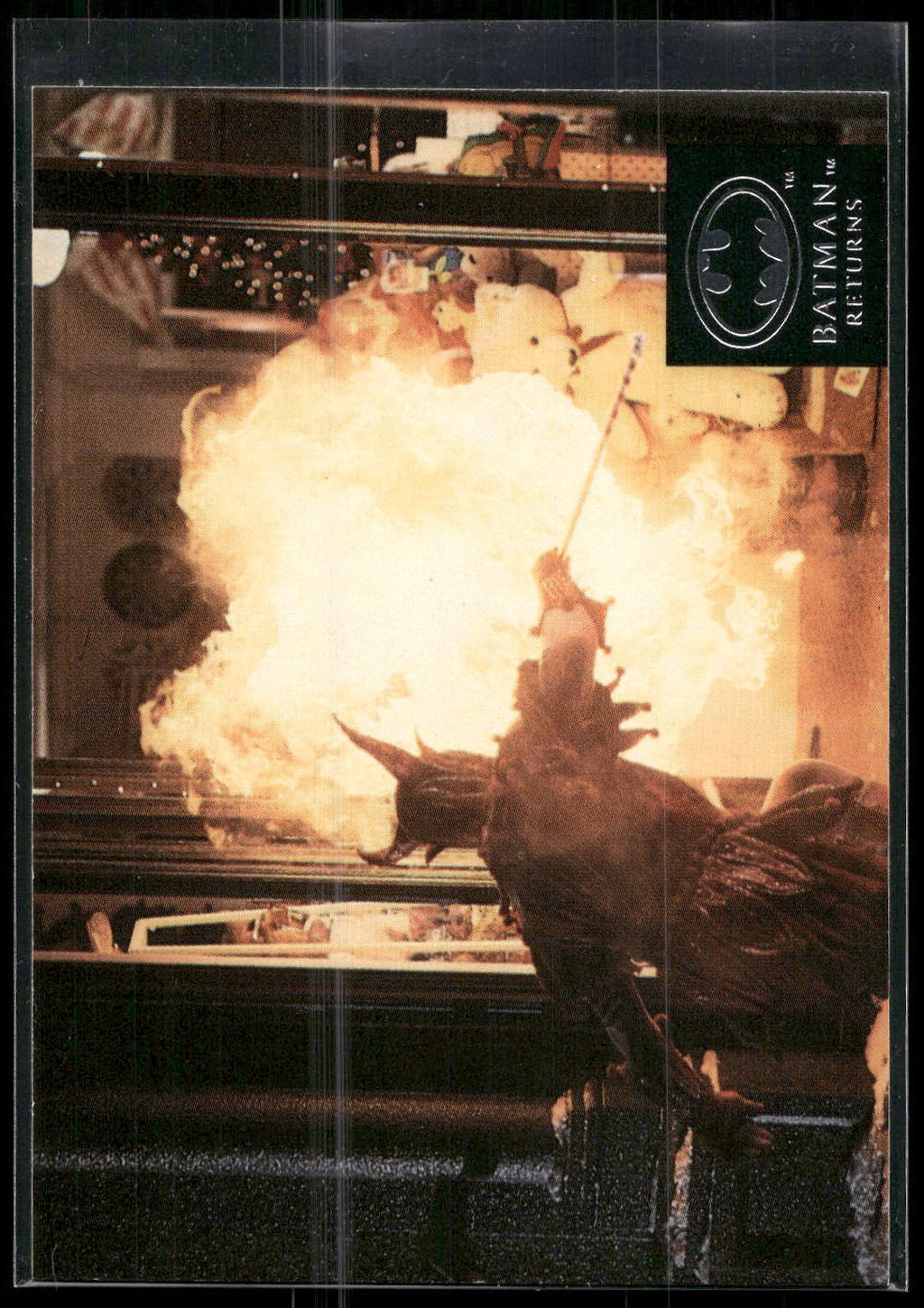 1992 Stadium Club Batman Returns #11 Batman has his hands The Penguin